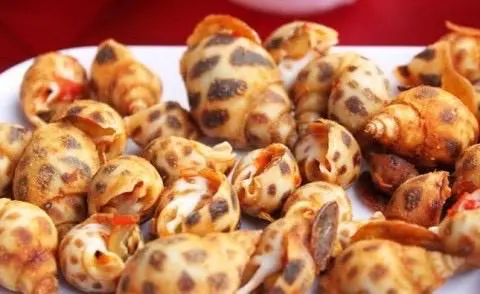 Hình ảnh Ốc hương xào tỏi