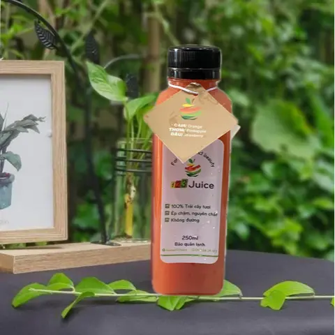 Hình ảnh Nước ép Cam - Thơm - Dâu 250ml