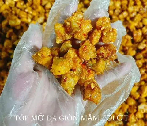 Hình ảnh da heo chiên giòn rim tỏi ớt túi zip50gm