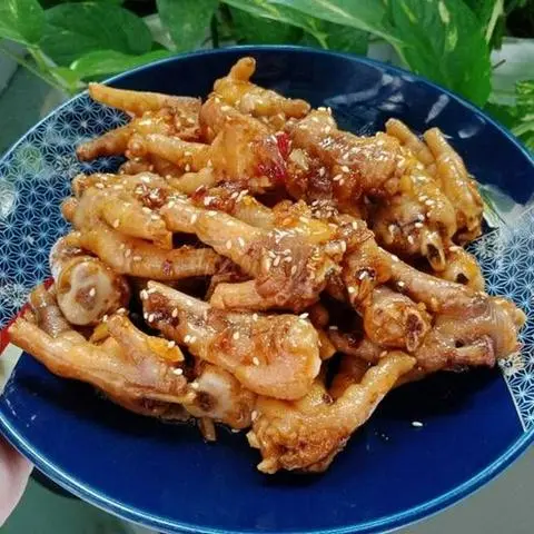 Hình ảnh Chân Gà Rút Xương Xào Bơ Tỏi - Nhỏ 