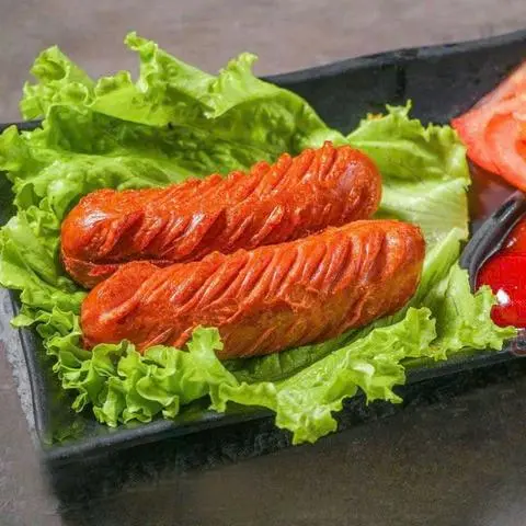 Hình ảnh 2 Cây Xúc Xích Chiên Bon Bon ( Romio)