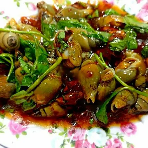 Hình ảnh Ốc cà na xào me