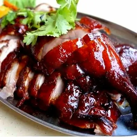 Hình ảnh Vịt nướng mật ong nguyên con - coca chai
