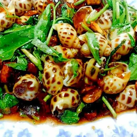 Hình ảnh Ốc hương xào bơ tỏi