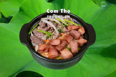 Hình ảnh Cơm thố bò - xá xíu