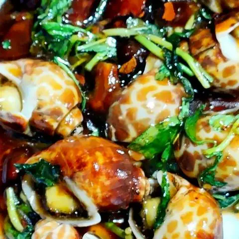 Hình ảnh Ốc hương quế xào me