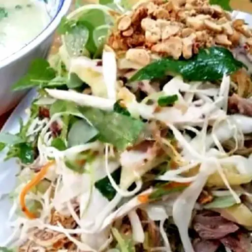 Hình ảnh Gà gỏi nguyên con - lòng - cháo