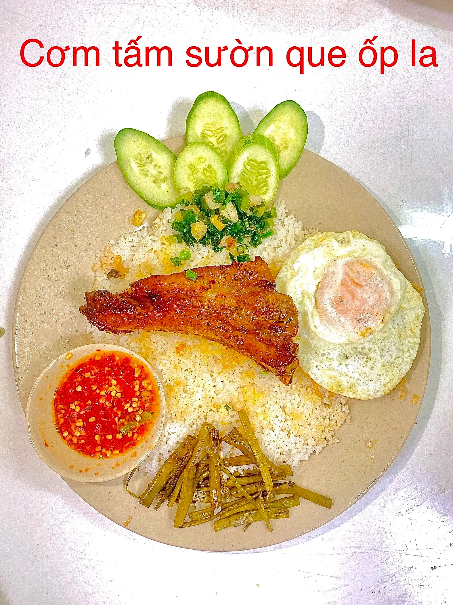 Hình ảnh Cơm Tấm Sườn Que Ốp La
