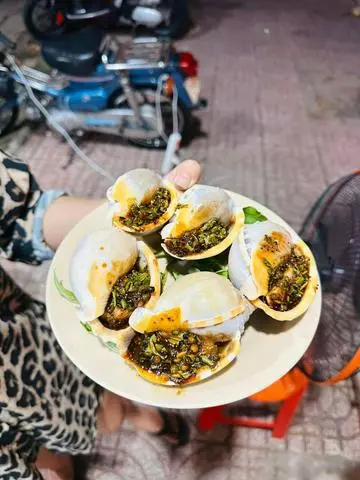 Hình ảnh Ốc tỏi nướng phô mai một con