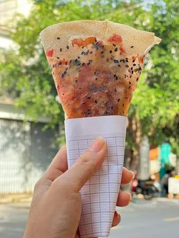 Hình ảnh Combo giòn rụm ( 4 snack, 1 bánh tráng nướng, 1 trà đào)