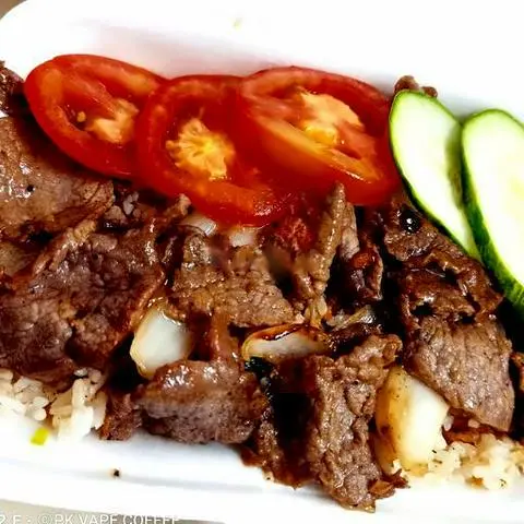 Hình ảnh Cơm chiên bò xào củ hành