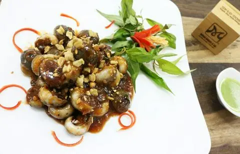 Hình ảnh Ốc mỡ xào me