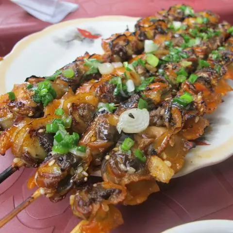 Hình ảnh ốc nướng sate thơm ngon/2xiên 