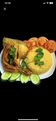 Hình ảnh Cơm Gà Xối Mỡ + Trứng + Nước Ngọt 