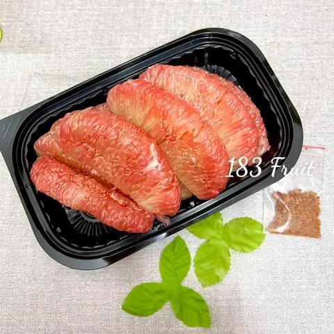 Hình ảnh Bưởi da xanh lột sẵn 1 trái