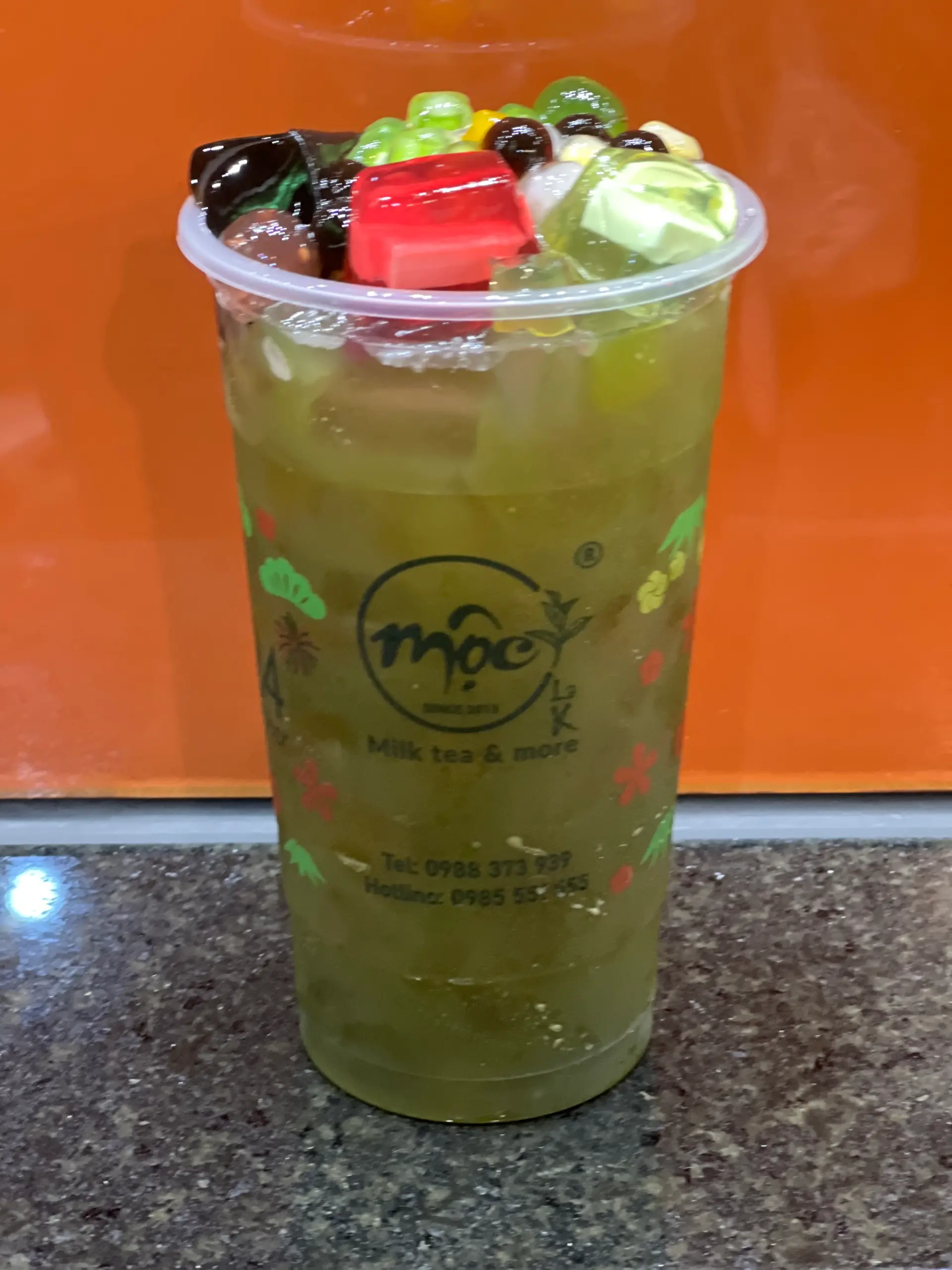 Hình ảnh Hồng trà kiwi full toopings