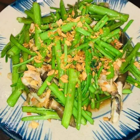 Hình ảnh ốc móng tay xào rau muống