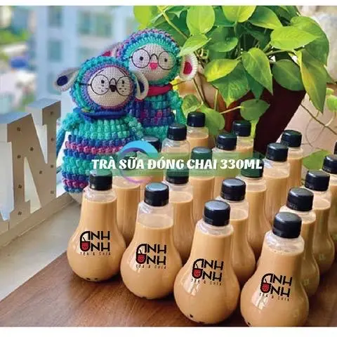Hình ảnh Trà sữa nguyên chất chai 330ml
