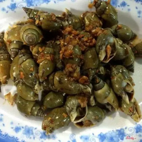 Hình ảnh Ốc cà na xào tỏi