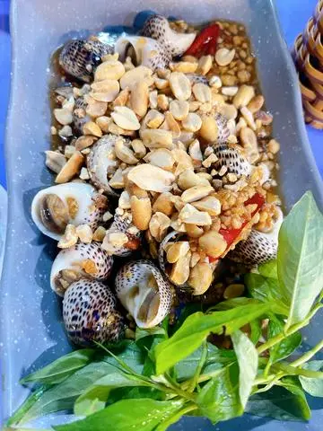 Hình ảnh Ốc bông xào me