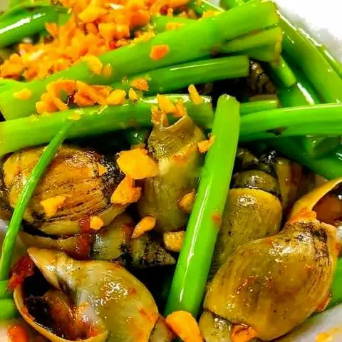 Hình ảnh ỐC CÀ NA XÀO RAU MUỐNG