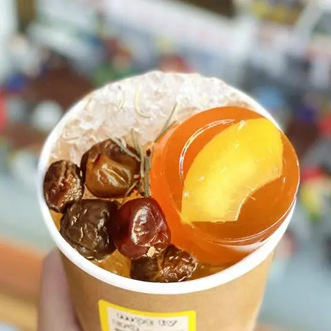 Hình ảnh Oolong Mơ Mật Đào thạch Cam Đào