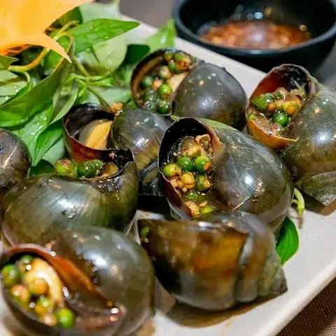 Hình ảnh Ốc bươu nướng tiêu xanh