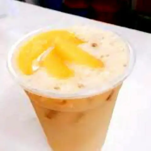 Hình ảnh Trà sữa đào size M - miếng đào