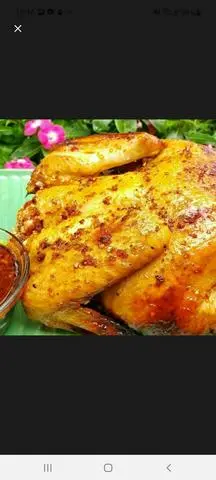 Hình ảnh Gà nướng sa tế nguyên con cắt sẵn