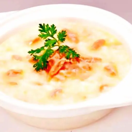 Hình ảnh Cháo cá hồi sốt gấc