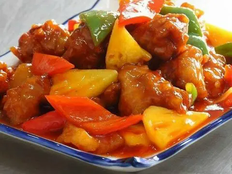 Hình ảnh CƠM CHIÊN SƯỜN XÀO CHUA NGỌT 