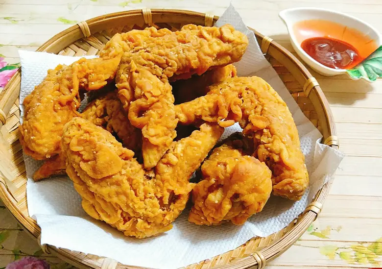 Hình ảnh Cánh gà rán + khoai tây chiên (100gram)