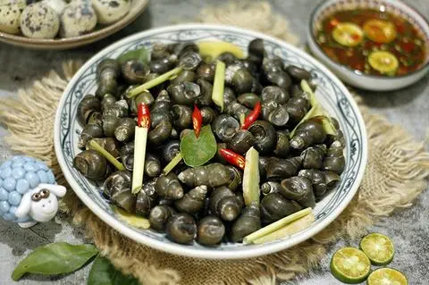 Hình ảnh ốc gạo hấp xã mắn gừng
