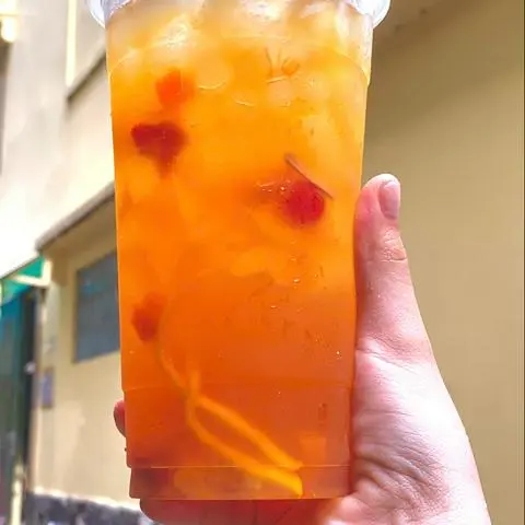 Hình ảnh trà đào hoa (  trà đào  ( topping ngũ vị)