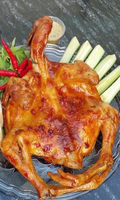 Hình ảnh Nửa con gà nướng mắm nhĩ + nửa con gà nướng muối ớt + 2 ly trà tắc 