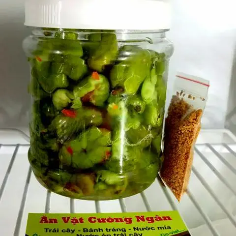 Hình ảnh Cà na tươi đập muối ớt 500gr