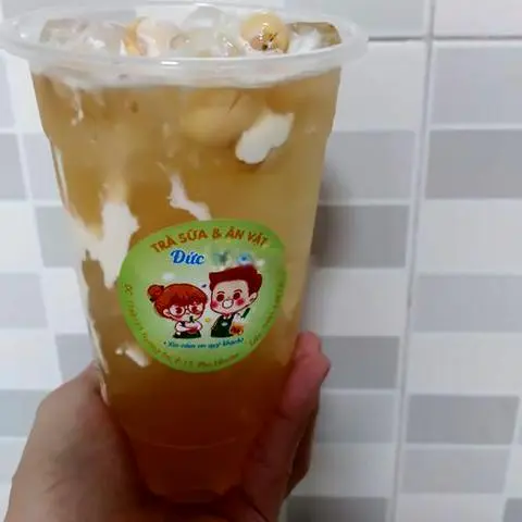 Hình ảnh Trà sen vàng macchiato