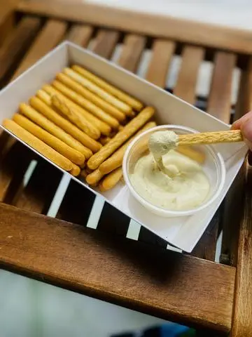 Hình ảnh Bánh que bơ+ chấm sốt kem trứng