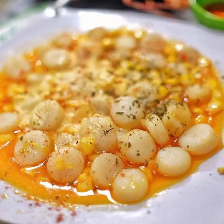 Hình ảnh Cồi sò điệp sốt bơ cay