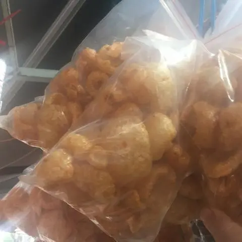 Hình ảnh da heo chiên giòn áo sốt bơ tỏi ớt bịch zip 100gram 