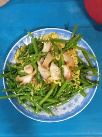 Hình ảnh ốc giác xào rau muống 
