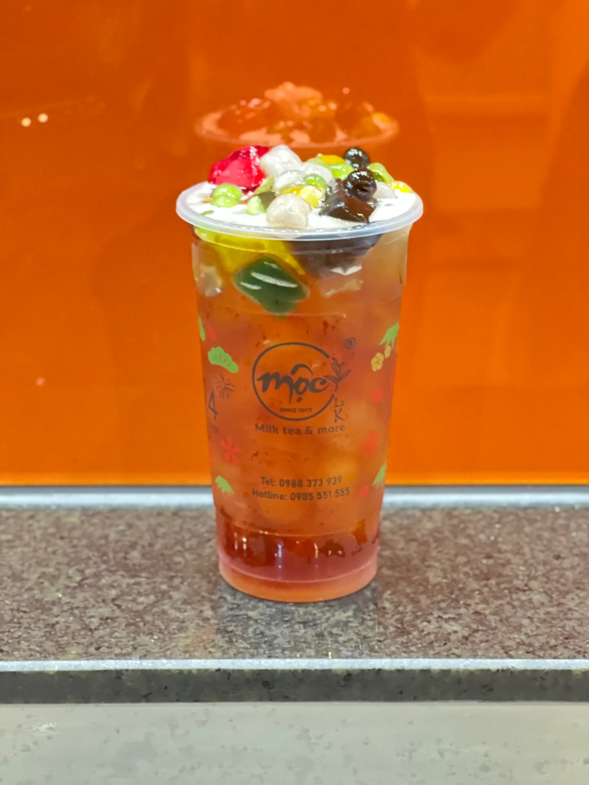 Hình ảnh Hồng trà vải full toppings