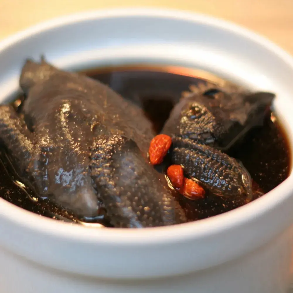 Hình ảnh Canh gà ác tiềm thuốc bắc