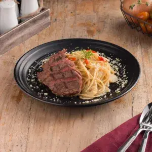 Hình ảnh Steak strips with spaghetti aglio e olio