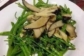 Hình ảnh Ốc giác xào rau muống