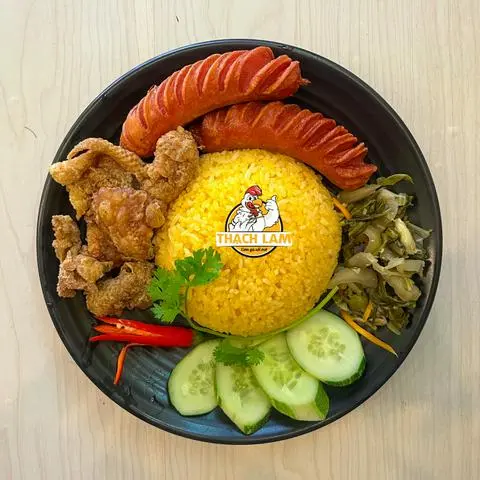 Hình ảnh Cơm xúc xích - da gà