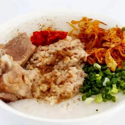 Hình ảnh Cháo sườn trứng cút rim nước mắm