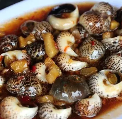 Hình ảnh Ốc bông xào me