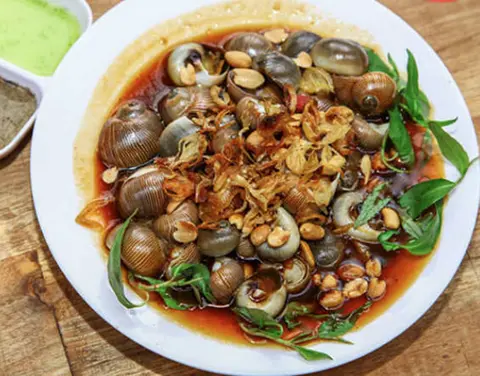 Hình ảnh Ốc mỡ rang me