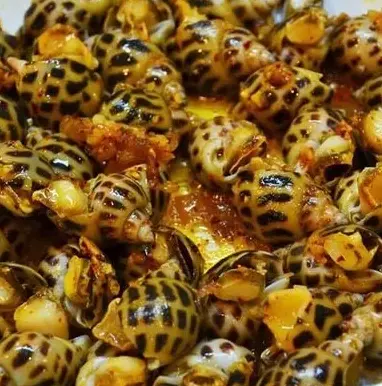 Hình ảnh Ốc hương xào me